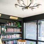 Hudson Valley Wide Aged Brass Wall Sconce Wholesale - Image 6